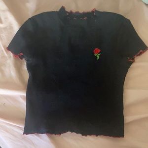 Rose, black skin tight shirt
